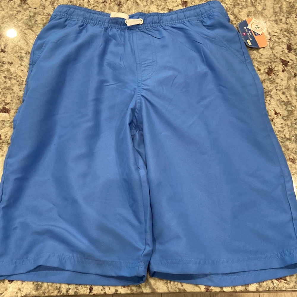 Brand new never warm kids swimming suit. Size is XL